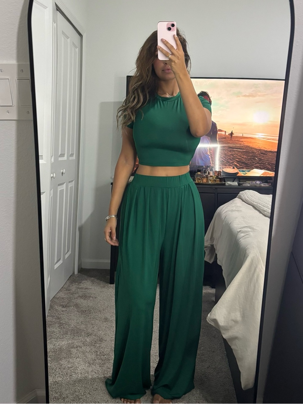 2 pc set. Crew neck short sleeved cropped top and matching wide leg pants.